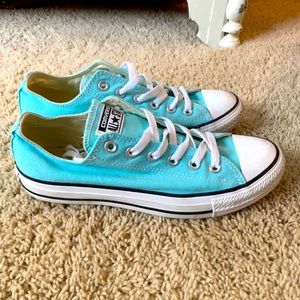 Light blue low cut converse